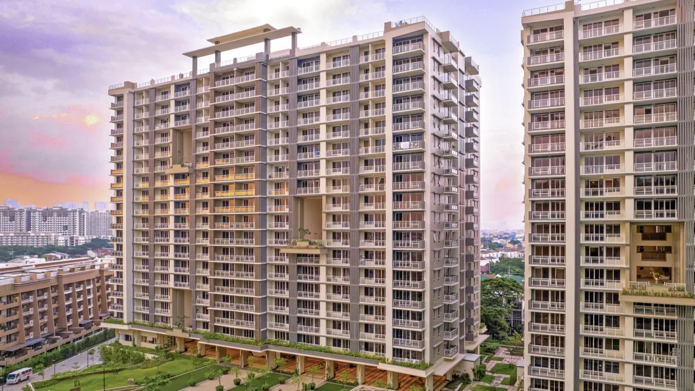 Two towers at Alder Residences seen from the grounds