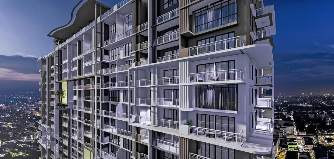 The Calinea Tower — 48-storey DMCI Homes condominium facade at night in East Grace Park, Caloocan City