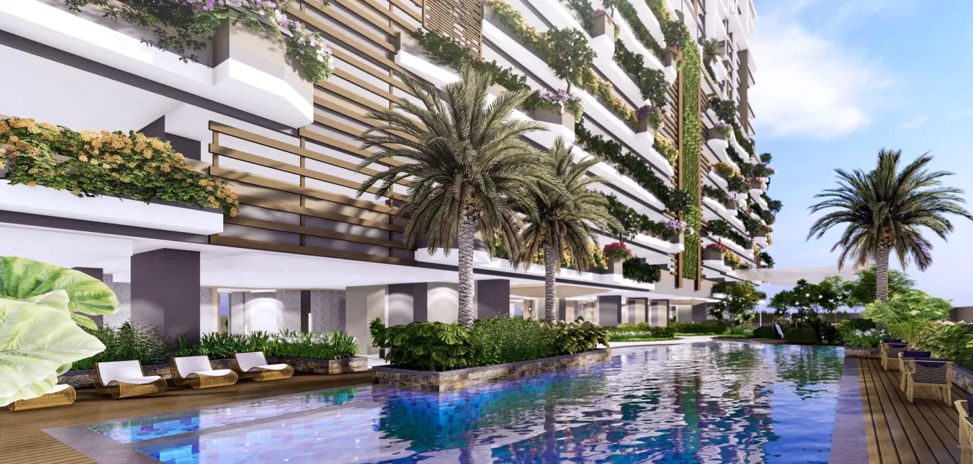 Landscaped podium pool deck at The Calinea Tower in daylight