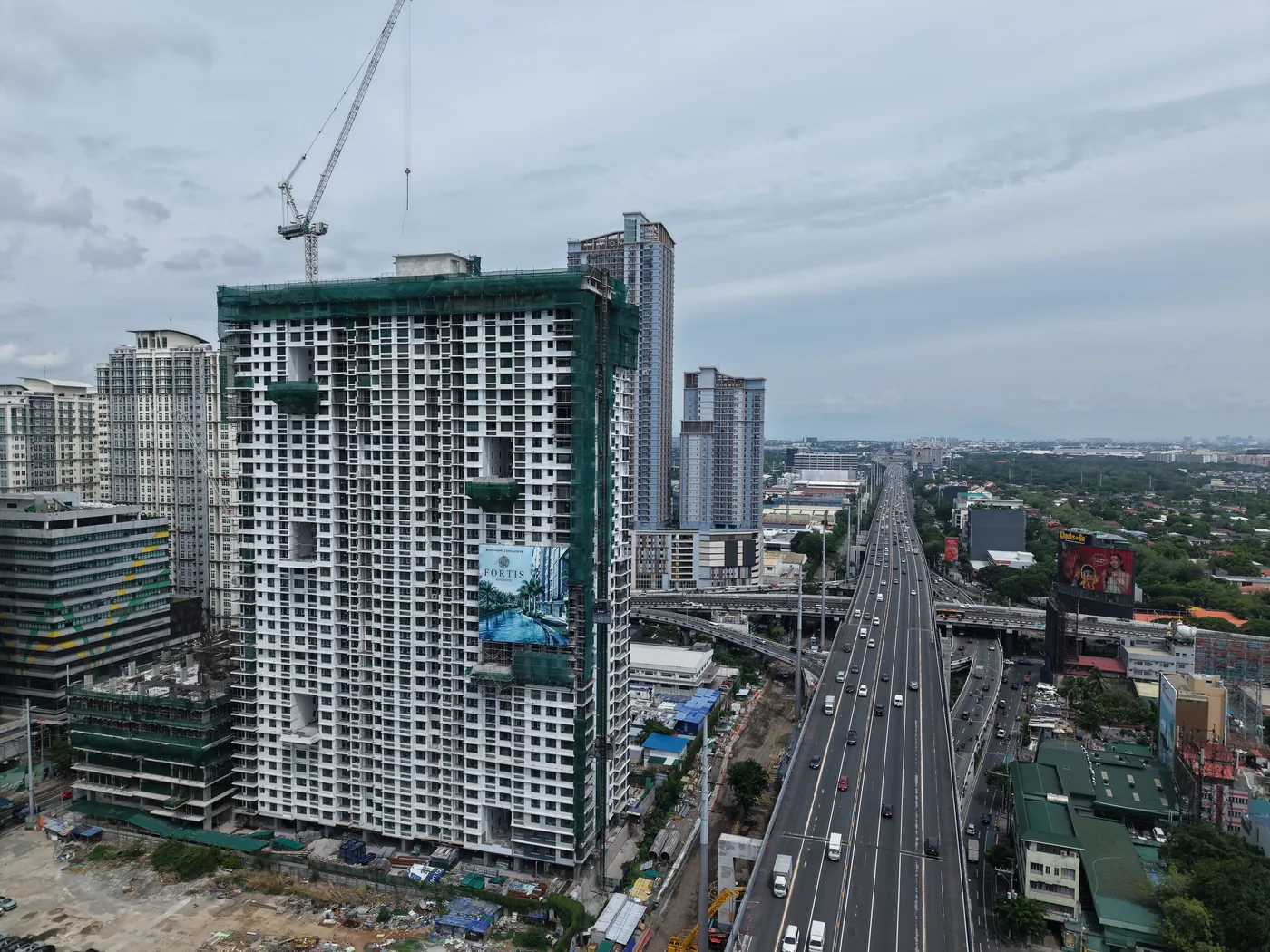 Fortis Residences under construction, aerial view June 2026, Makati