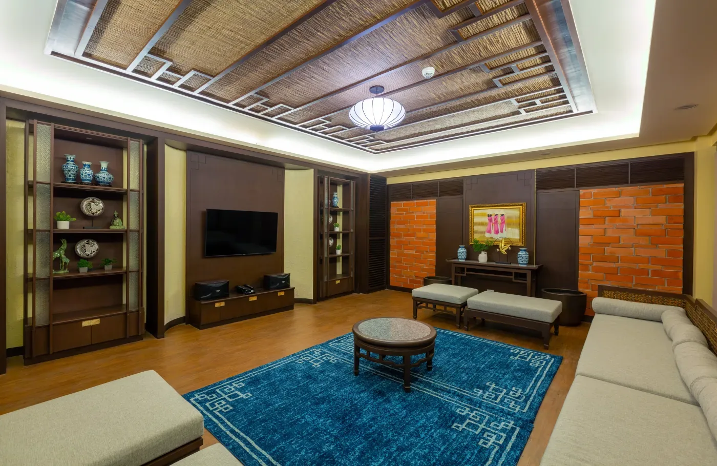 Audio-visual room at Mulberry Place with seating and a large screen