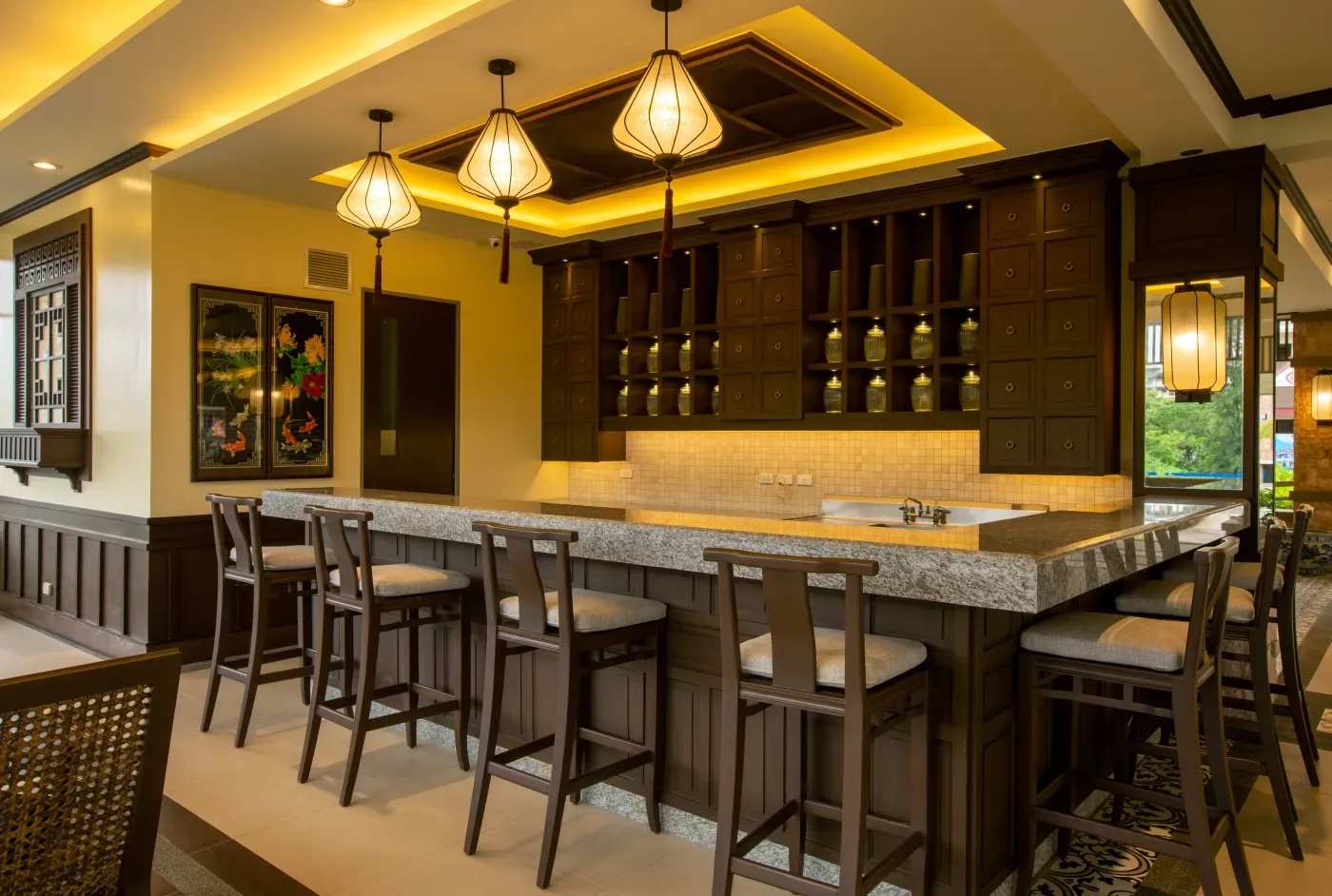 Bar area at the Mulberry Place clubhouse with pendant lanterns