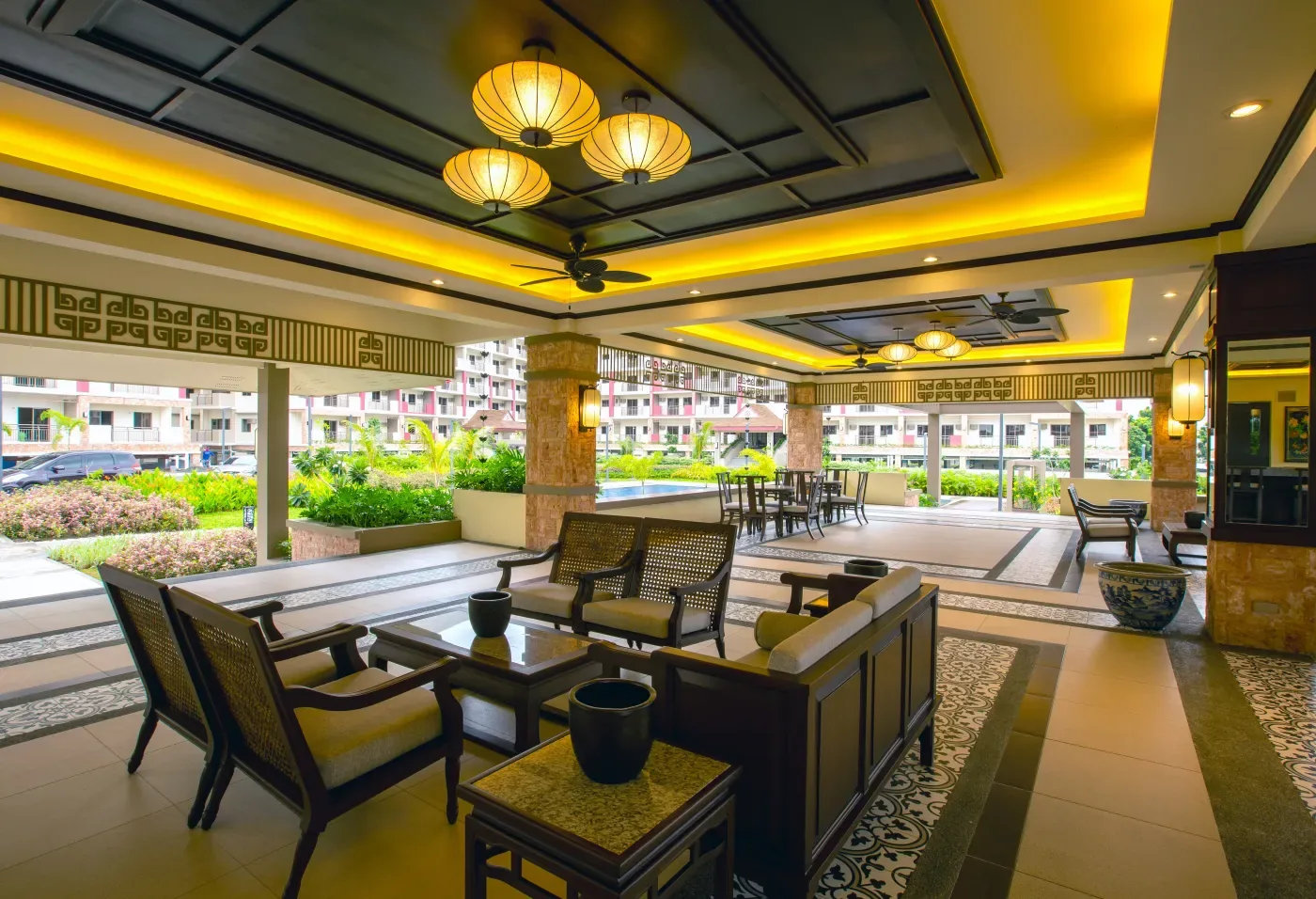 Covered lounge area at Mulberry Place overlooking the pool deck