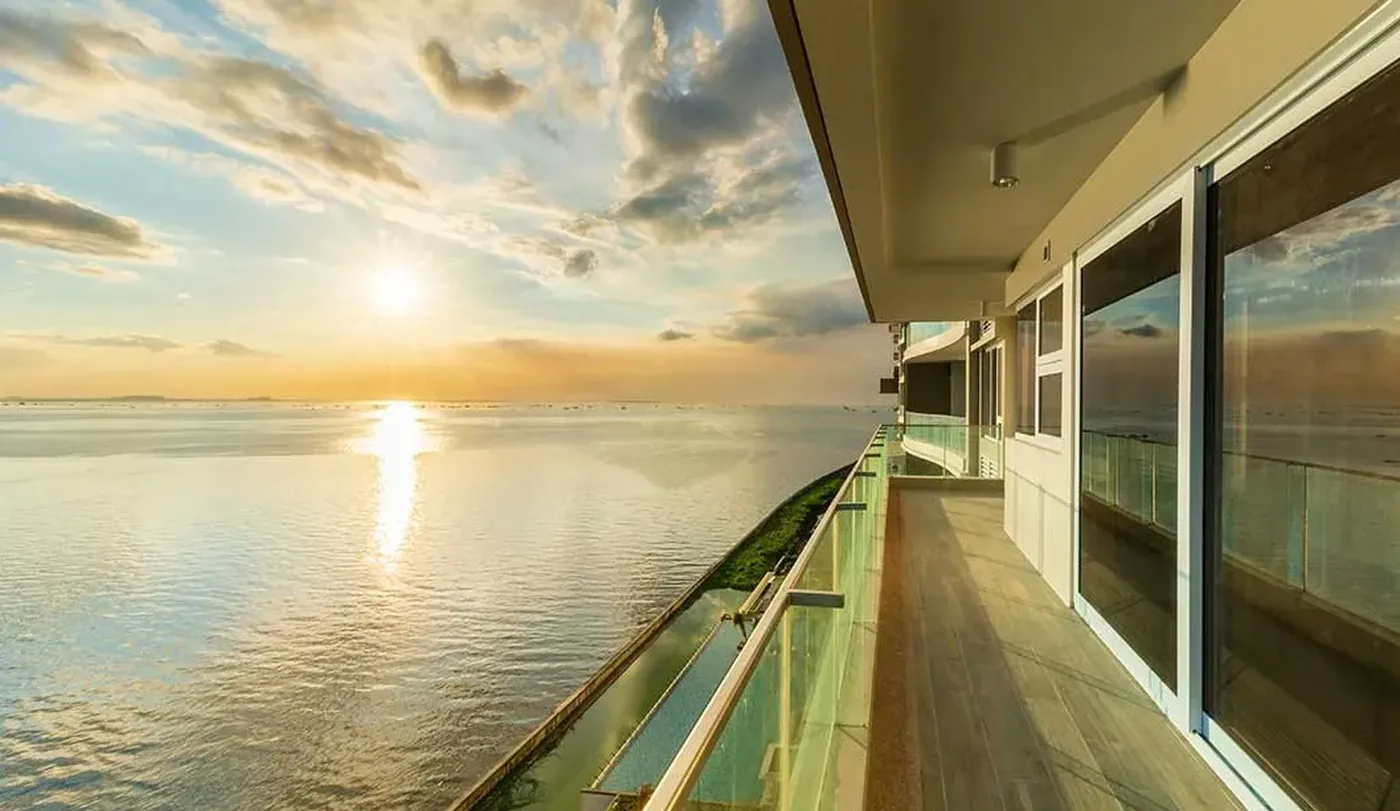 Manila Bay sunset seen from a corridor at Oak Harbor Residences, Parañaque
