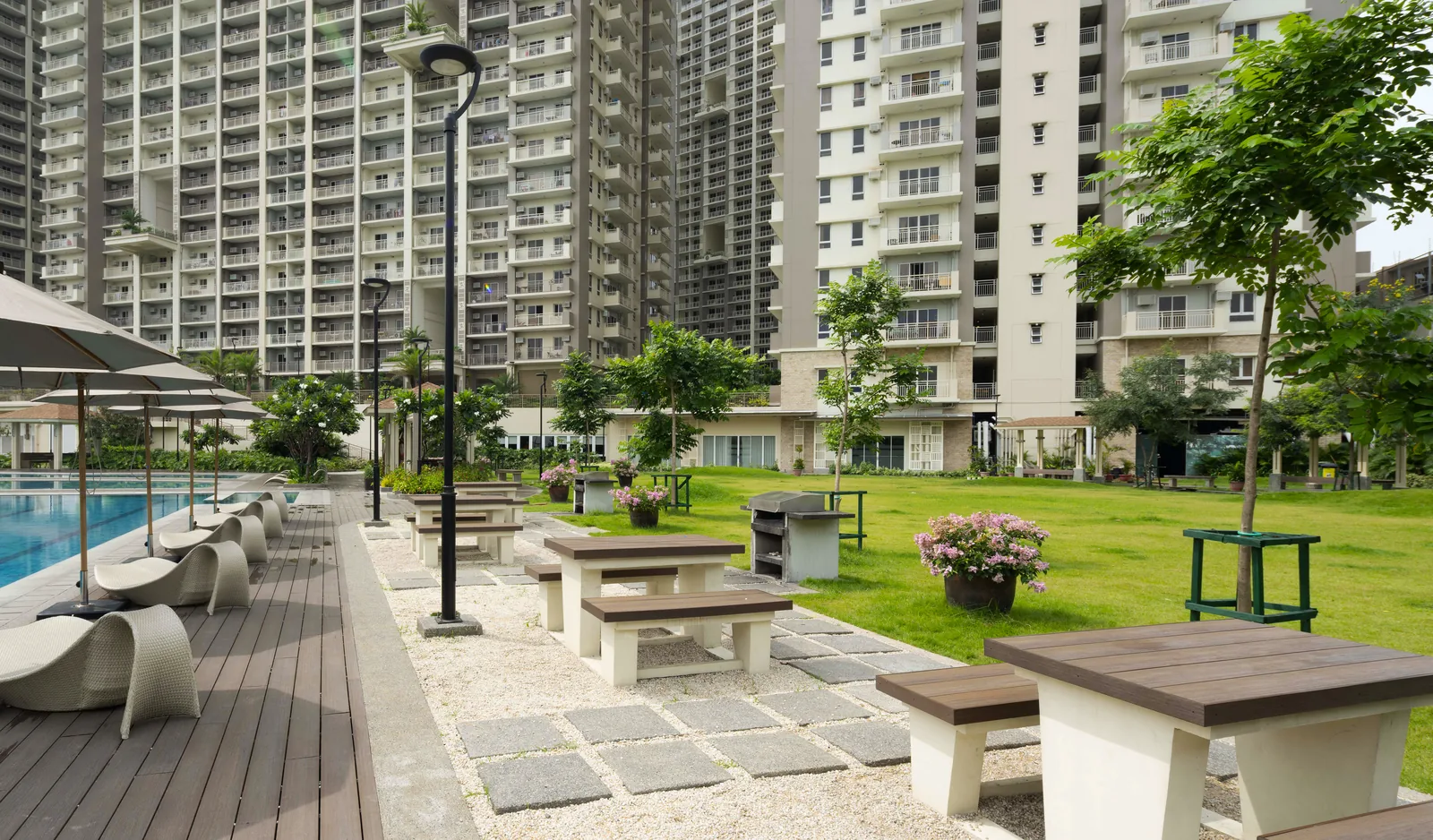 The picnic area and pool deck at Prisma Residences