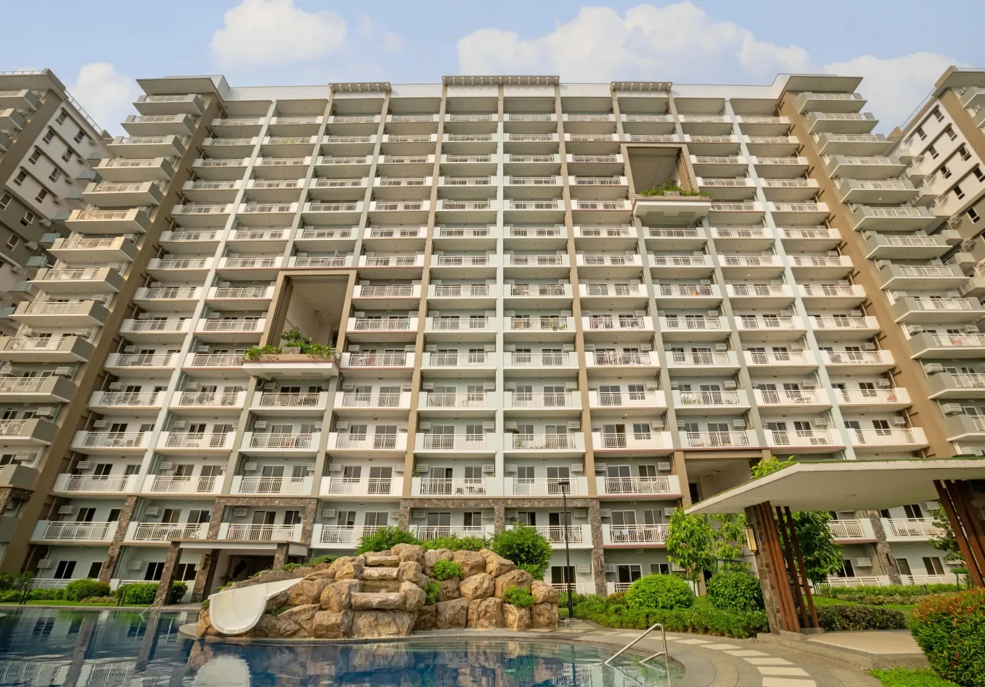 Lounge pool with rock waterfall feature at Satori Residences, Pasig City