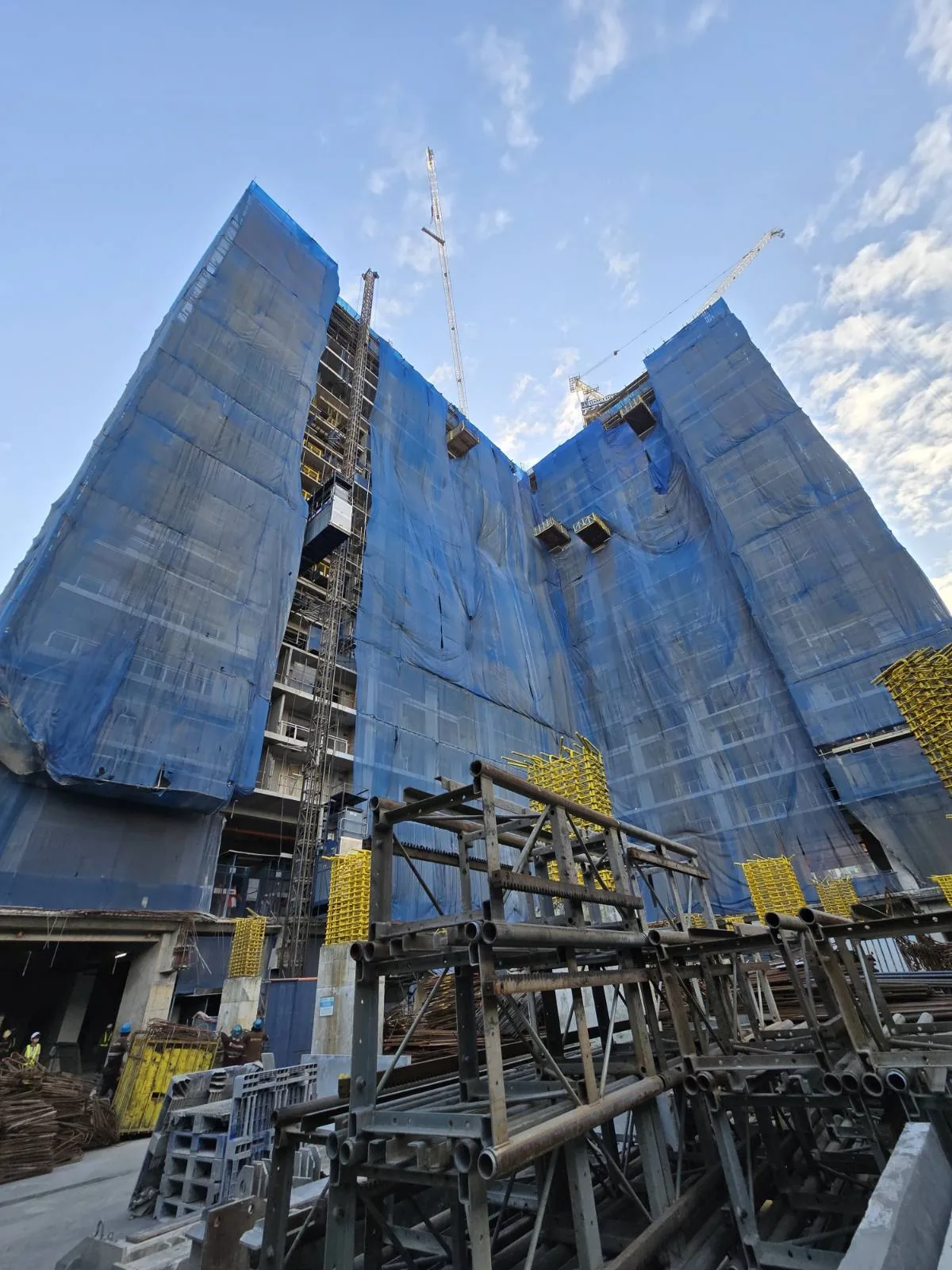 Sage Residences facade under construction, seen from the site